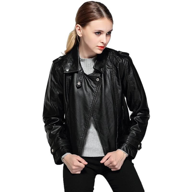 Stylish woman wearing a black leather jacket over a grey sweater, representing modern men and women fashion.